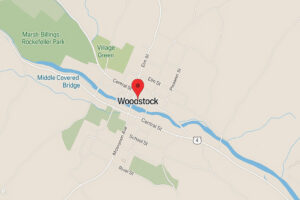 Scenic village green with historic New England homes in Woodstock Vermont