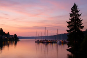 Sunrise over the marina and mountains highlighting photography spots port ludlow along the peaceful waterfront