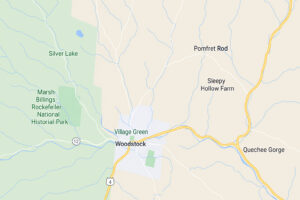 Sunny village streets and clear sky showing current woodstock vermont weather in the heart of town