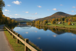 Forest trail along the river showing bellows falls hiking with scenic cliffs and peaceful nature views
