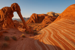 Scenic desert highway winding through red rock landscapes and mountain views during a Southern Nevada road trip.