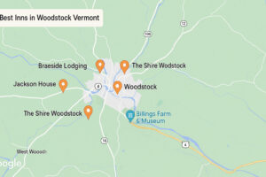 Elegant exterior view of Woodstock Inn and Resort with landscaped gardens and classic Vermont architecture