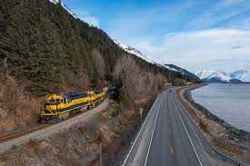 Glaciers, fjords, and Dall sheep along a coastal highway where mountains plunge into the Turnagain Arm.