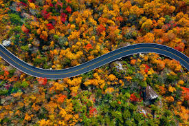 Less-traveled roads winding past forgotten valleys, abandoned barns, and serene vistas untouched by crowds